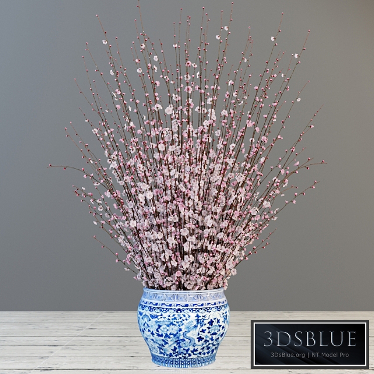 A large bouquet of cherry in the Chinese vase.