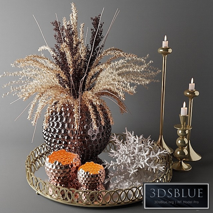 Bouquet of dried flowers in a glass vase on a tray