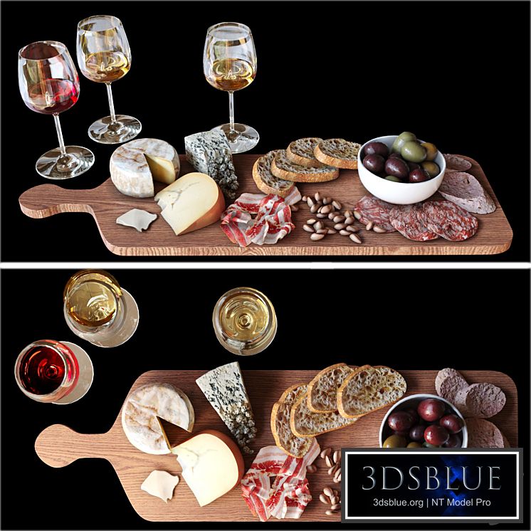 A meat plate with pieces of blue cheese and a glass of red wine. Alcohol 2