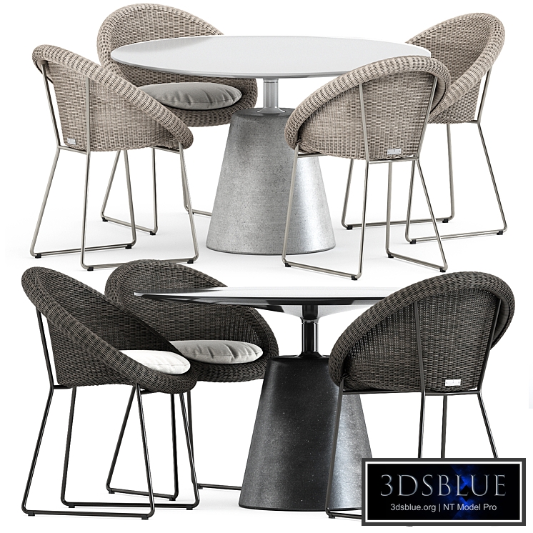 Gigi II Armchair by Janus et cie and Rock Table by Mdf Italia