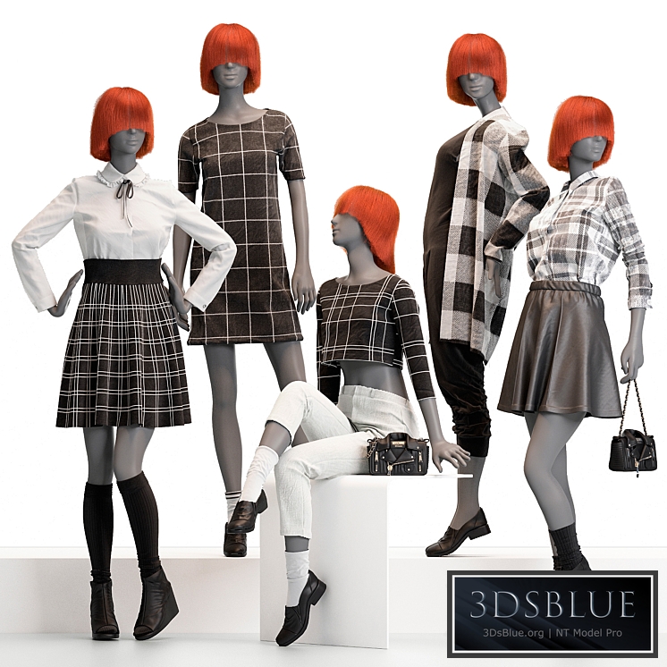Female mannequins with clothes