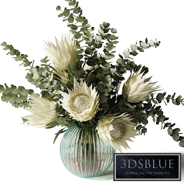 Bouquet with white proteas and eucalyptus in a ribbed glass vase