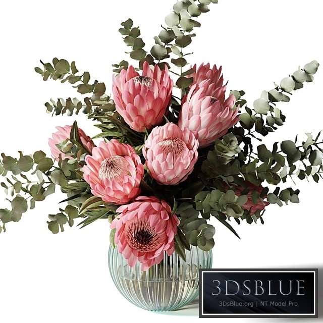 Bouquet with pink proteas and eucalyptus in a ribbed glass vase
