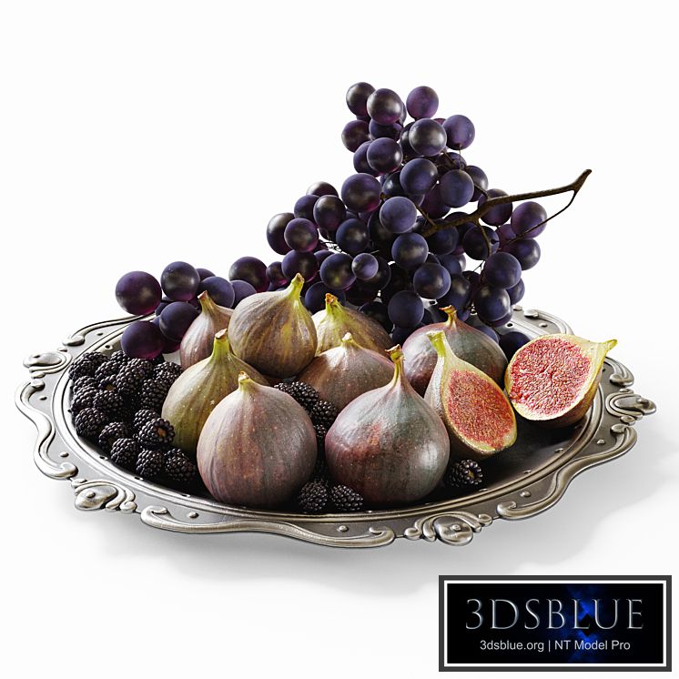Grapes, figs and blackberries in a classic plate