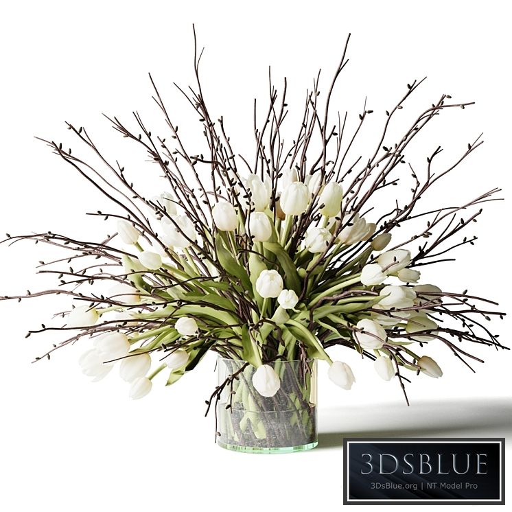 Bouquet of white tulips and branches in a glass vase