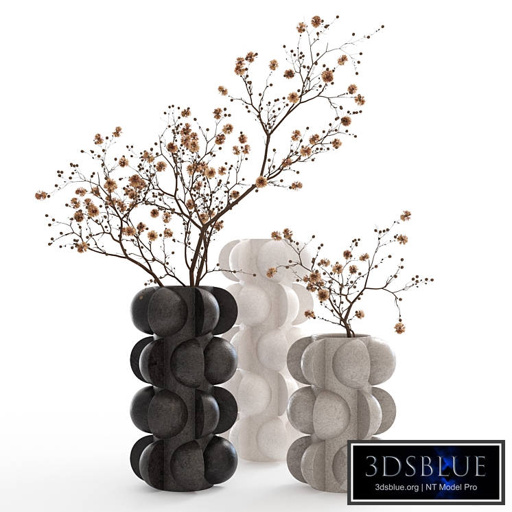 Dry branches in vases with spheres.