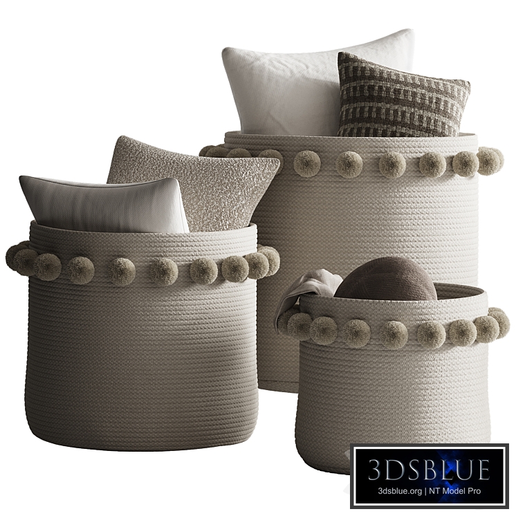 Basket with pompoms and pillows